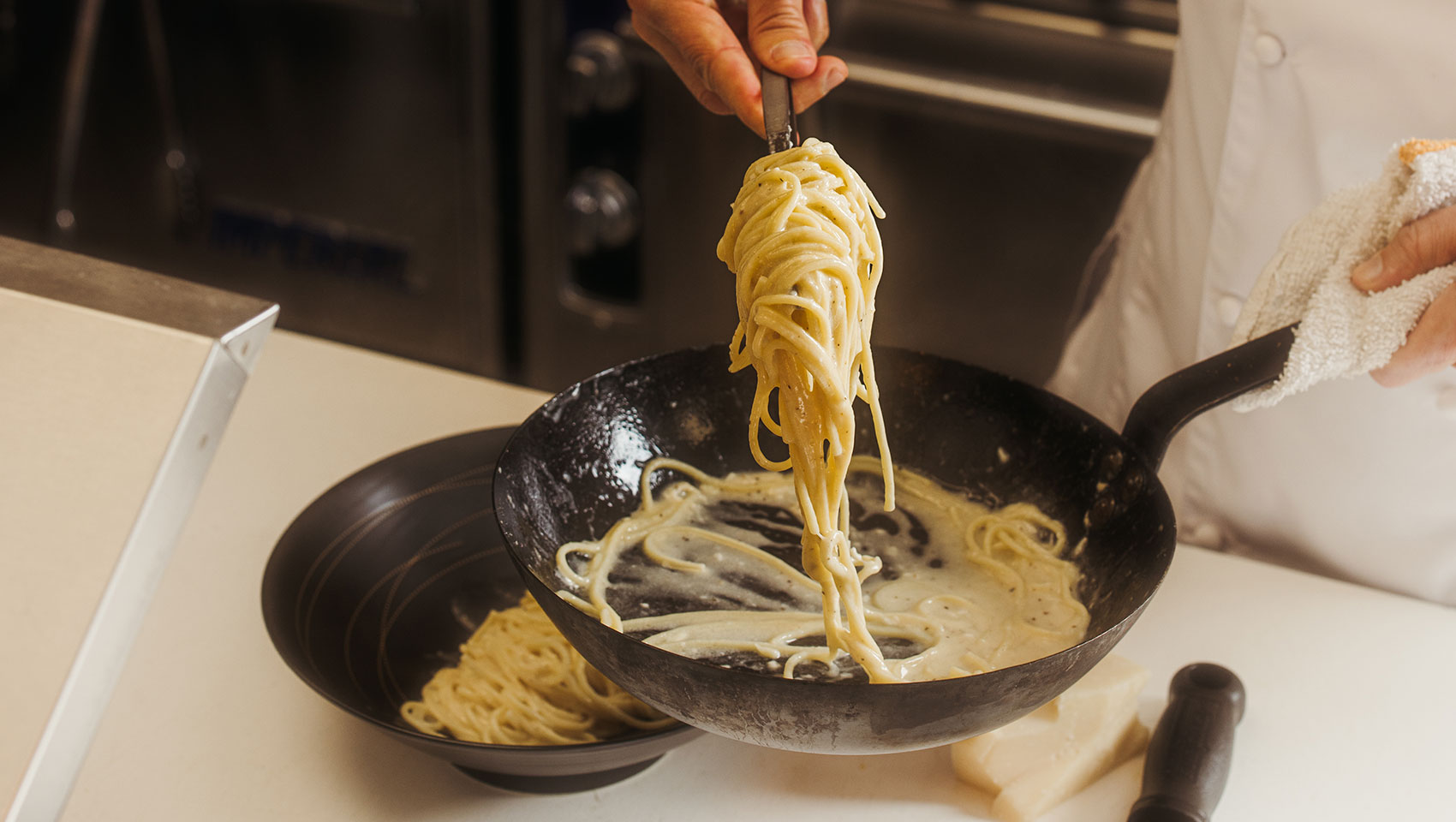 chef with pasta at cavalier san antonio